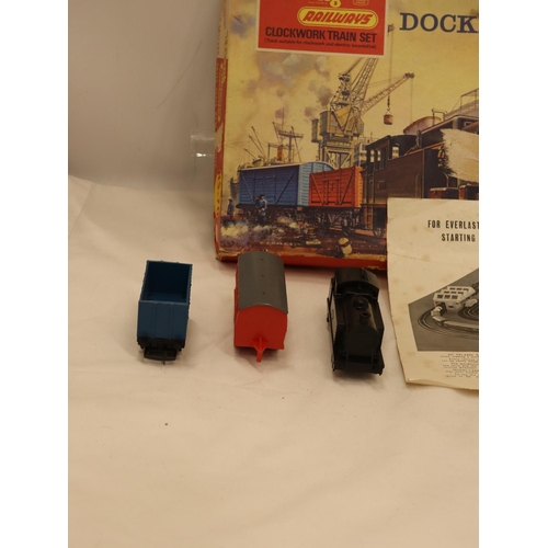 116 - A VINTAGE TRI-ANG DOCKMASTER CLOCKWORK TRAIN SET - BOXED