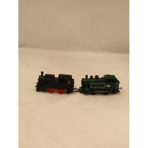 130 - TWO TOY TRI-ANG TRAINS