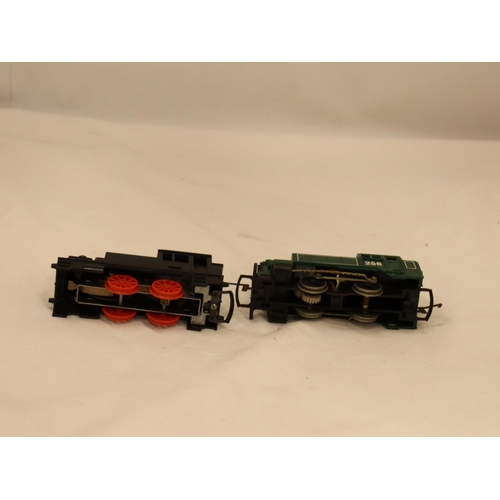 130 - TWO TOY TRI-ANG TRAINS