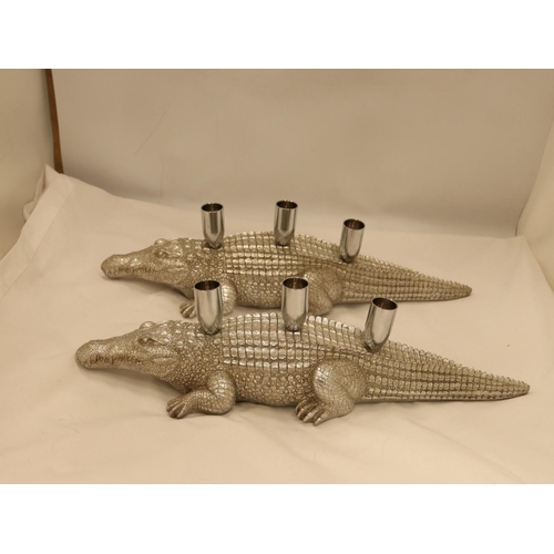 134 - A PAIR OF HEAVY SILVER COLOURED CROCODILE CANDLE HOLDERS, LENGTH 44CM