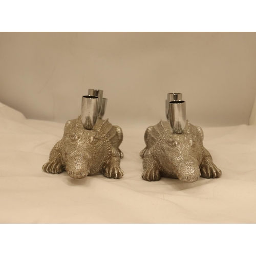 134 - A PAIR OF HEAVY SILVER COLOURED CROCODILE CANDLE HOLDERS, LENGTH 44CM