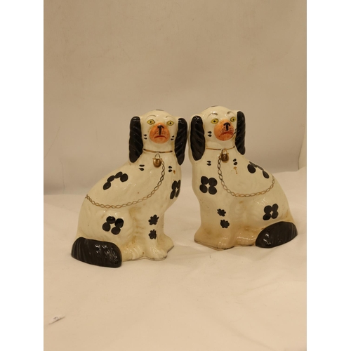 144 - A PAIR OF ARTHUR WOOD STAFFORDSHIRE SPANIELS, HEIGHT 20CM