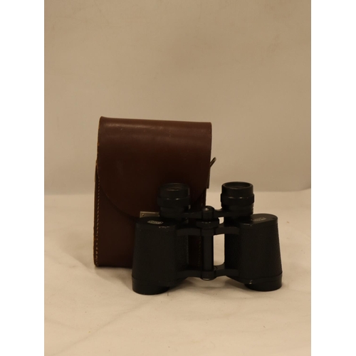 150 - A PAIR OF CARL ZEISS BINOCULARS IN A LEATHER CASE