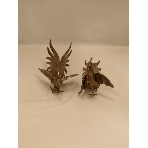 152 - A PAIR OF VINTAGE WHITE METAL FIGHTING COCK FIGURES