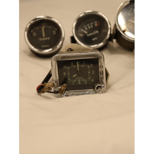 161 - FIVE VINTAGE CAR CLOCKS/GAUGES