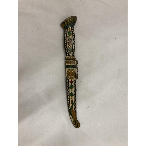 165 - AN ORNATE ENAMEL DESIGN DAGGER AND SCABBARD