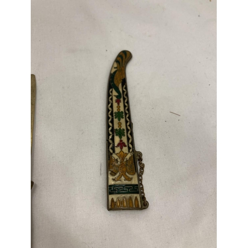 165 - AN ORNATE ENAMEL DESIGN DAGGER AND SCABBARD