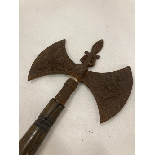 166 - A VINTAGE DOUBLE HEADED GRYPHON AXE