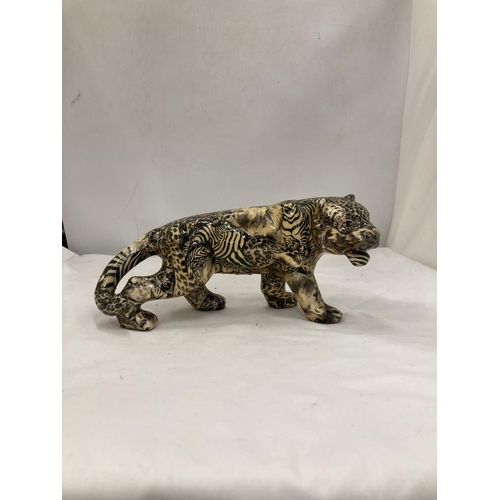 169 - A MODEL OF A LARGE CAT WITH A PATCHWORK SAFARI DESIGN, HEIGHT 15CM, LENGTH 30CM