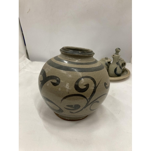 195 - A STUDIO POTTERY BULBOUS VASE, PLATE AND CRUETS WITH MAKERS NAME TO THE BASE