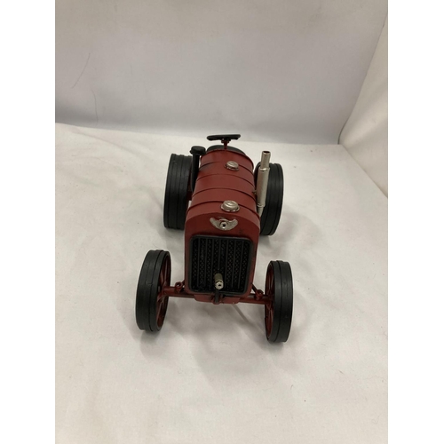 198 - A TIN PLATE AND STEEL RED TRACTOR, HEIGHT 15CM, LENGTH 25CM