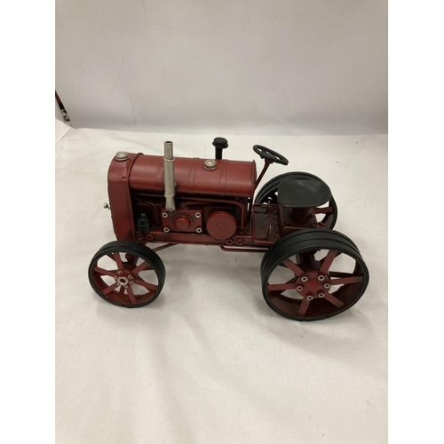 198 - A TIN PLATE AND STEEL RED TRACTOR, HEIGHT 15CM, LENGTH 25CM