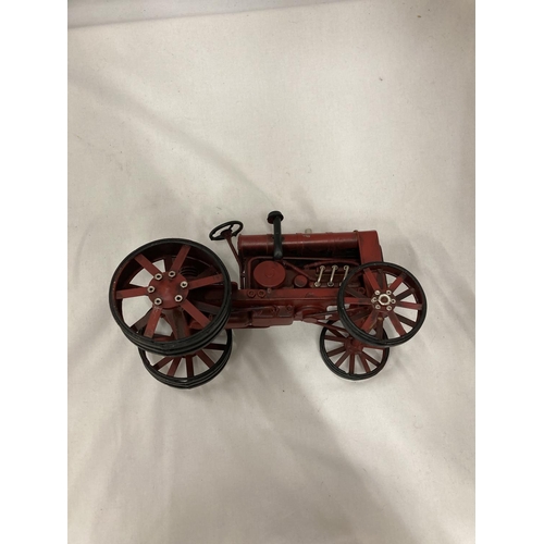 198 - A TIN PLATE AND STEEL RED TRACTOR, HEIGHT 15CM, LENGTH 25CM