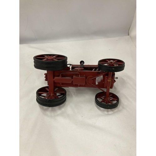 198 - A TIN PLATE AND STEEL RED TRACTOR, HEIGHT 15CM, LENGTH 25CM