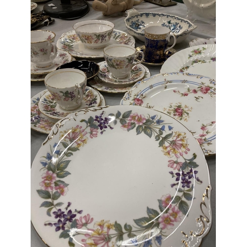 225 - A LARGE QUANTITY OF VINTAGE CHINA TEAWARE TO INCLUDE PARAGON TRIOS, CAKE PLATE AND SUGAR BOWL, ELIZA... 