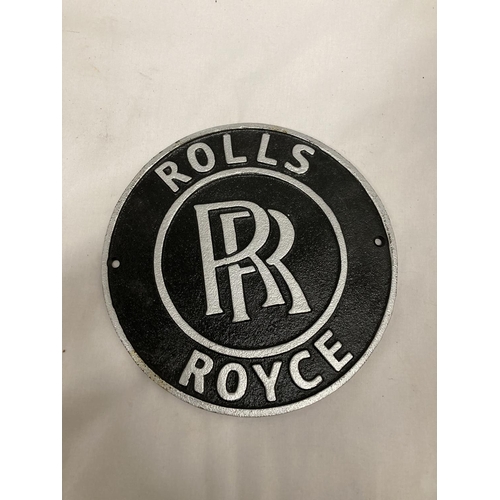 231 - A CAST BLACK AND SILVER ROLLS ROYCE SIGN, DIAMETER 24CM