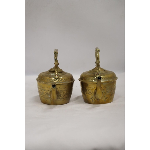 238 - TWO SMALL VINTAGE BRASS TEAPOTS