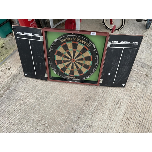 1628 - A NODOR CLARKE AND YOUNG DARTBOARD AND WOODEN CUPBOARD MOUNT