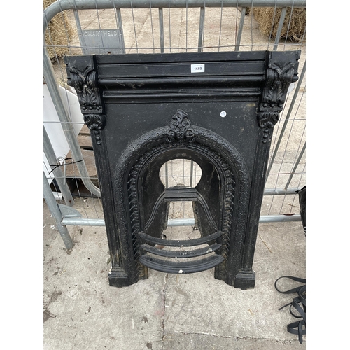 1659 - A DECORATIVE CAST IRON FIRE PLACE