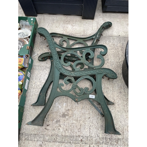 1702 - A PAIR OF CAST IRON BENCH ENDS