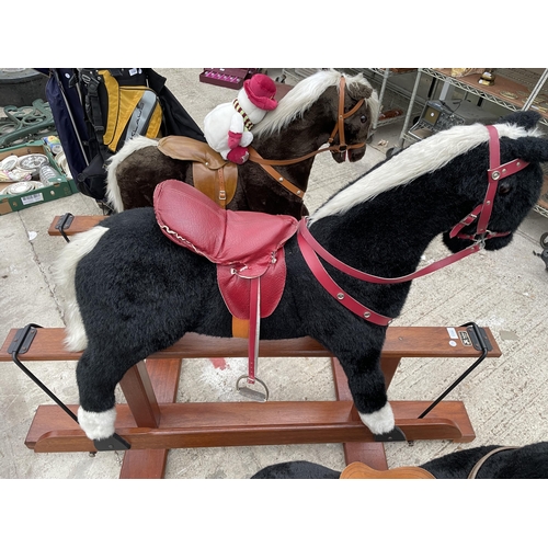 1706 - A VINTAGE PEGASUS BLACK AND WHITE ROCKING HORSE