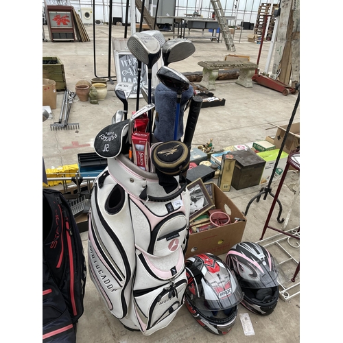 1716 - A MOTORCADDY GOLF BAG AND CLUBS TO INCLUDE A KING COBRA DRIVER AND A HIPPO DRIVER AND WOODS