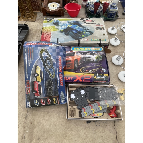 1727 - FOUR BOXES OF SCALEXTRIC TO INCLUDE MOTO GP WORLD CHAMPIONSHIP, ETC - ALL BOXES SOLD AS SEEN