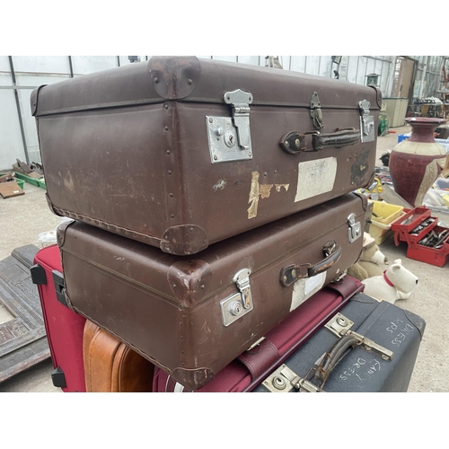 1801 - SIX VARIOUS SUITCASES TO INCLUDE VINTAGE EXAMPLES