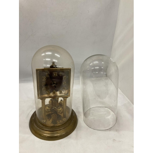 25 - A VINTAGE SQUARE FACED ANNIVERSARY CLOCK WITH GLASS DOME AND A FURTHER DOME