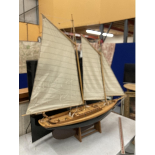 34 - A LARGE MODEL OF A SAILING SHIP