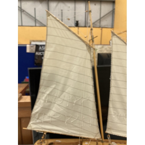 34 - A LARGE MODEL OF A SAILING SHIP