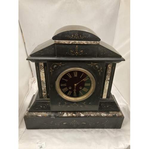 35 - A LARGE DECORATIVE MARBLE AND SLATE MANTLE CLOCK