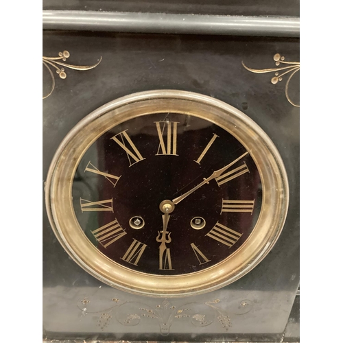 35 - A LARGE DECORATIVE MARBLE AND SLATE MANTLE CLOCK