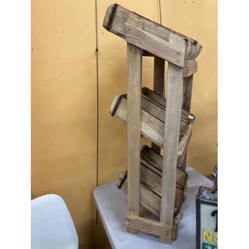 38 - A WOODEN STAND WITH SIX BRICK MOULD BOXES