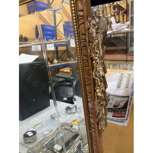 44 - A LARGE DECORATIVE VINTAGE GILT FRAMED WALL MIRROR WITH TWIN HANDLED URN TOP