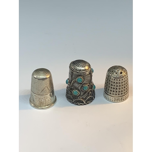 47 - THREE THIMBLES ONE WITH DECORATIVE TURQUOISE STONES