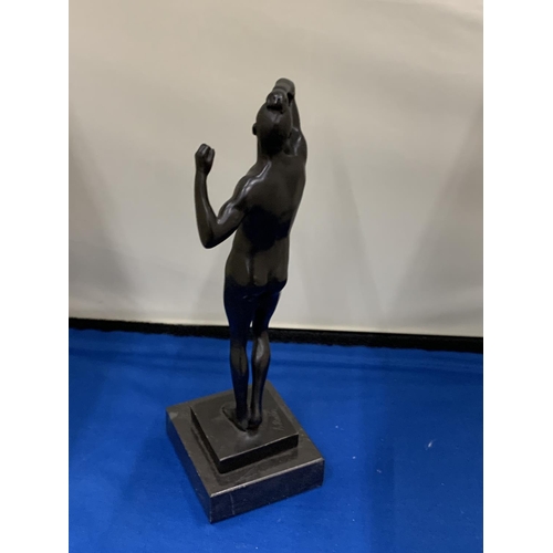 8 - A BRONZE SCULPTURE OF A MAN ON A MARBLE BASE SIGNED