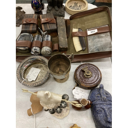 865 - A MIXED LOT TO INCLUDE A GENTLEMAN'S GROOMING KIT, FIGURES, A VINTAGE TAPE MEASURE, ETC