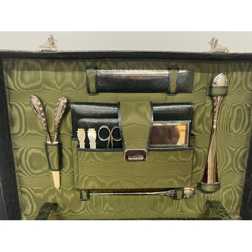 1 - AN EDWARDIAN CROCODILE SKIN LADIES TRAVEL CASE WITH FABRIC PROTECTION COVER CONTAINING ORIGINAL AND ... 