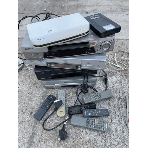 2478 - AN ASSORTMENT OF VHS PLAYERS WITH REMOTE CONTROLS TO INCLUDE PANASONIC ETC