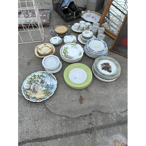 2027 - A LARGE ASSORTMENT OF CERAMICS TO INCLUDE PLATES AND CUPS ETC