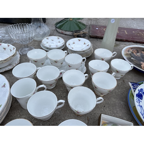 2032 - AN ASSORTMENT OF CERAMICS AND GLASS WARE TO INCLUDE PLATES AND TRIOS ETC