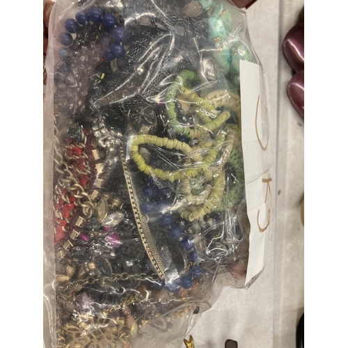 243 - A LARGE QUANTITY OF ASSORTED COSTUME JEWELLERY - 5KG IN TOTAL