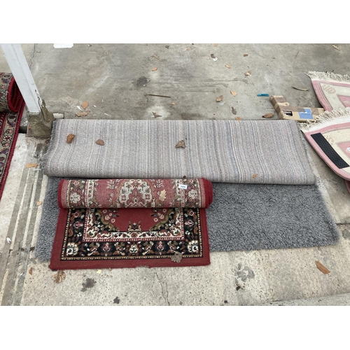 2494 - A SMALL RED PATTERNED RUG AND A MODERN GREY RUG