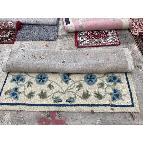 2496 - A CREAM PATTERNED RUG