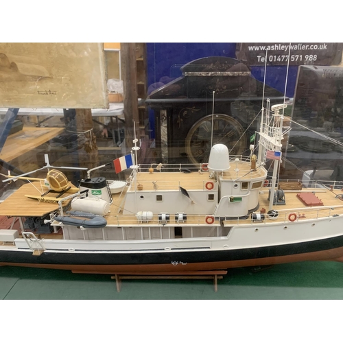 3 - A LARGE MODEL OF A BOAT WITH HELICOPTER IN A GLASS CASE