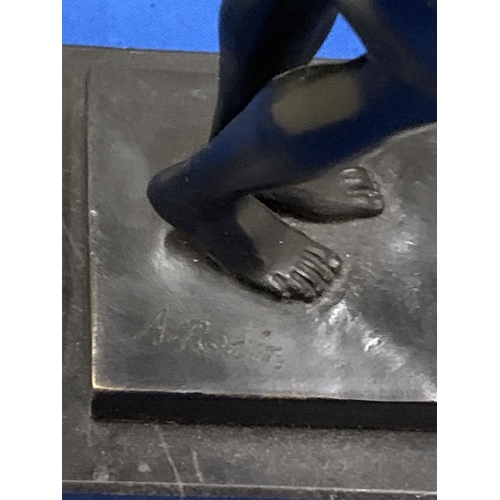 8 - A BRONZE SCULPTURE OF A MAN ON A MARBLE BASE SIGNED