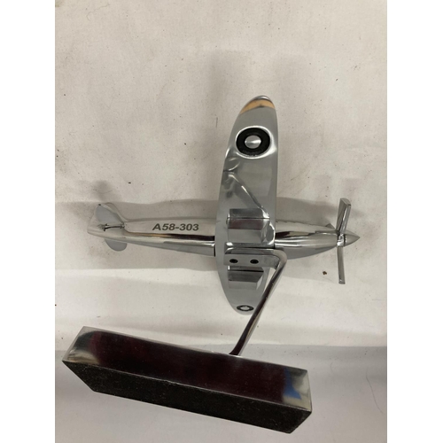 15 - A CHROME SPITFIRE ON A STAND