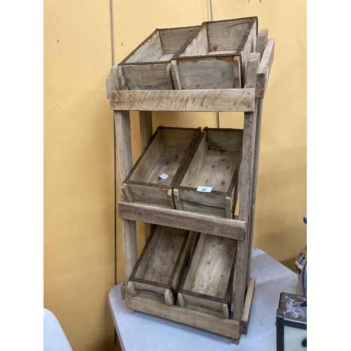 38 - A WOODEN STAND WITH SIX BRICK MOULD BOXES