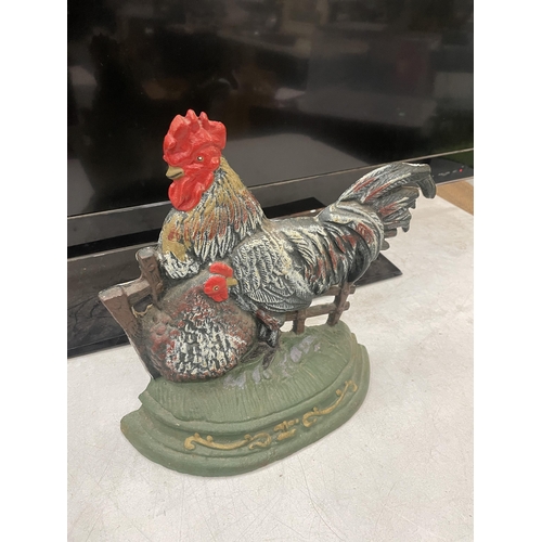 58 - A CAST IRON HEN DOOR STOP